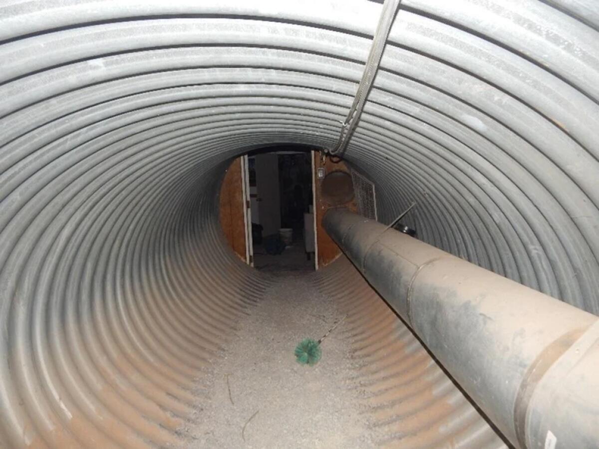 The inside of a long tube-shaped tunnel