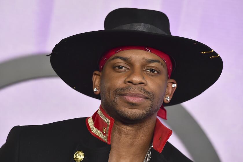 Jimmie Allen arrives at the American Music Awards on Sunday, Nov. 20, 2022, at the Microsoft Theater in Los Angeles. (Photo by Jordan Strauss/Invision/AP)