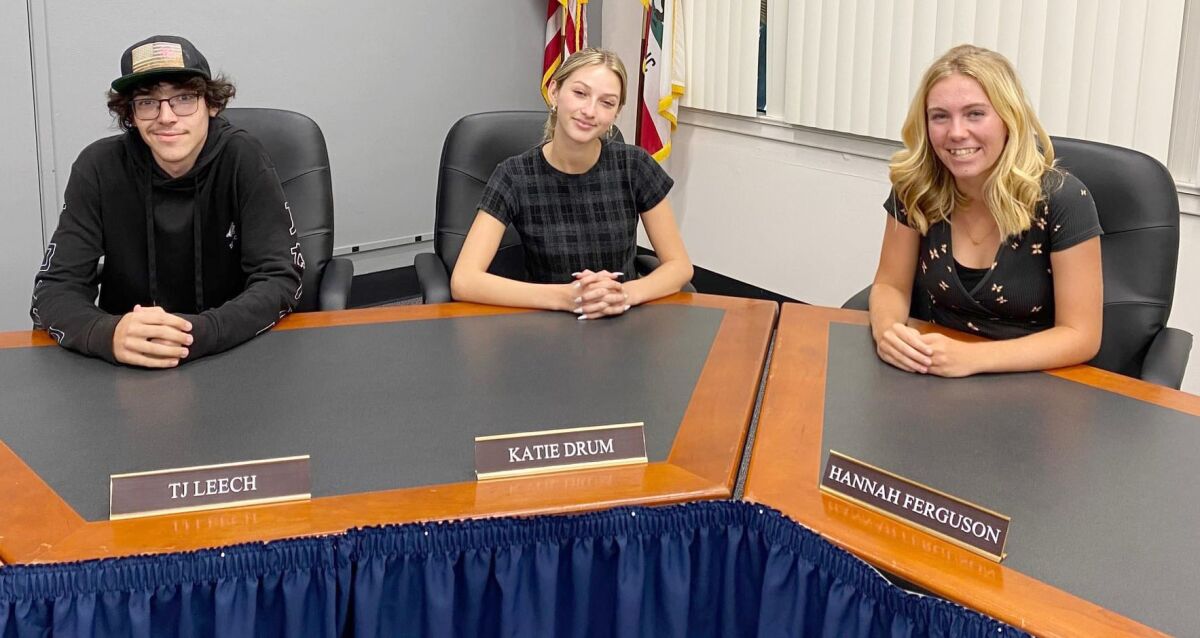 Katie Drum, center, is Ramona High’s school board student representative. Also shown are TJ Leech, left, and Hannah Ferguson.