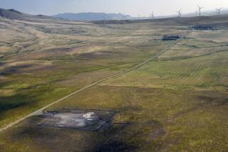 In this image provided by the U.S. Air Force, wind turbines spin near the Malmstrom Air Force Base missile launch site Alpha-03 in Geyser, Mont., in August 2023. As the nation's energy needs have increased, turbines have grown in size and number, and are being placed closer to the underground silos where Minuteman III intercontinental ballistic missiles are kept ready to fire. The Air Force is concerned that the turbines are making it dangerous for their helicopter crews to fly out to the sites, often flying low and fast, when responding to an alarm at one of the silos. The service is seeking a two nautical mile buffer zone around the sites. (John Turner/U.S. Air Force via AP)