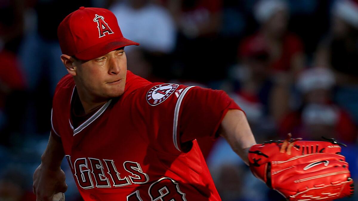 Angels starter Garrett Richards delivers at pitch during the first inning of the team's 6-2 win over the Minnesota Twins on Wednesday.