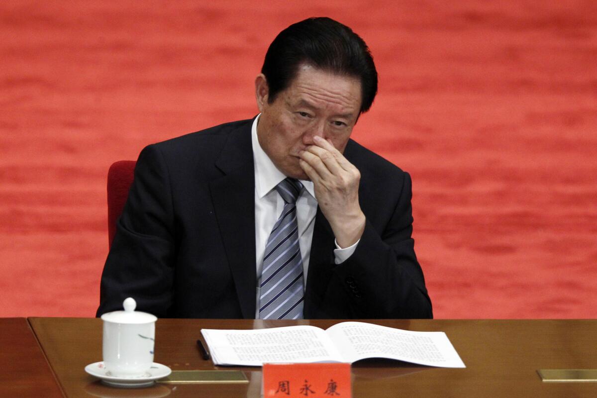 Zhou Yongkang attends a conference in Beijing on May 4, 2012.
