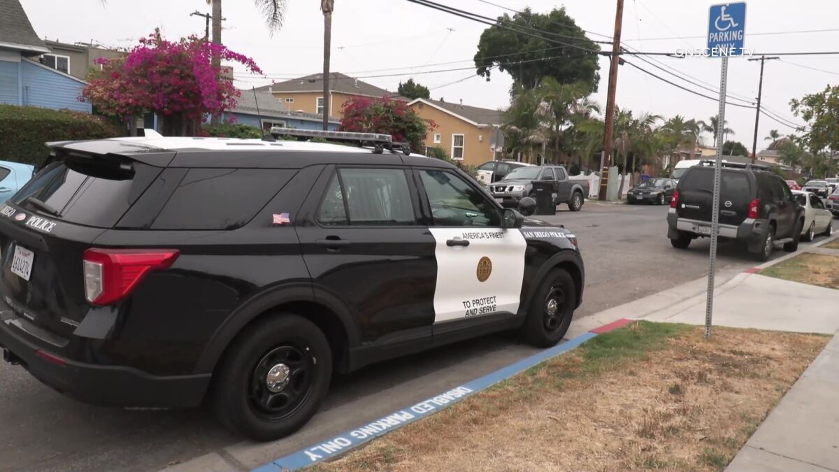 San Diego police patrol SUV parked on residential street