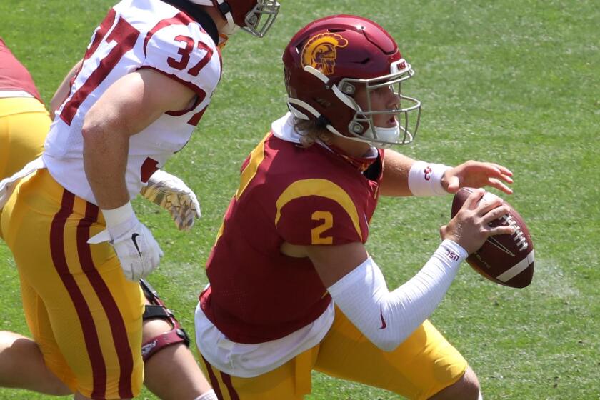 USC freshman quarterback Jaxson Dart plays during the Trojan's spring football game.