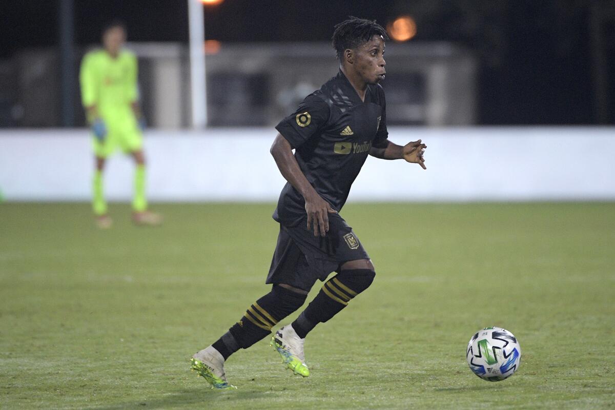 LAFC forward Latif Blessing controls a ball during the second half against the Portland Timbers.