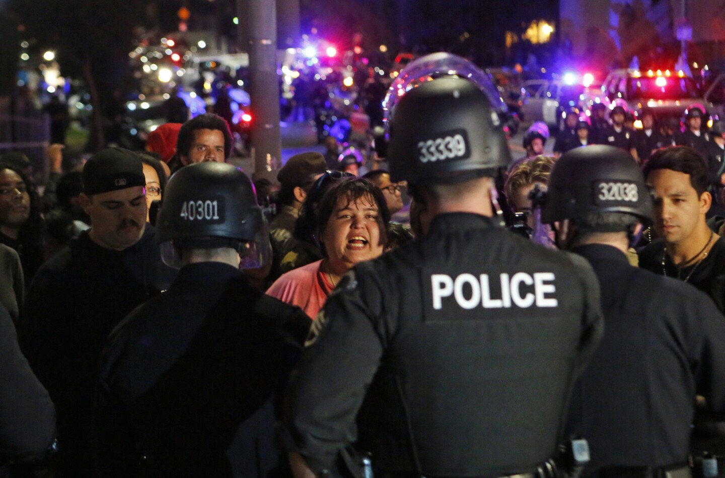 A protester yells at police on Alvarado Street, where demonstrators were blocked from moving forward.
