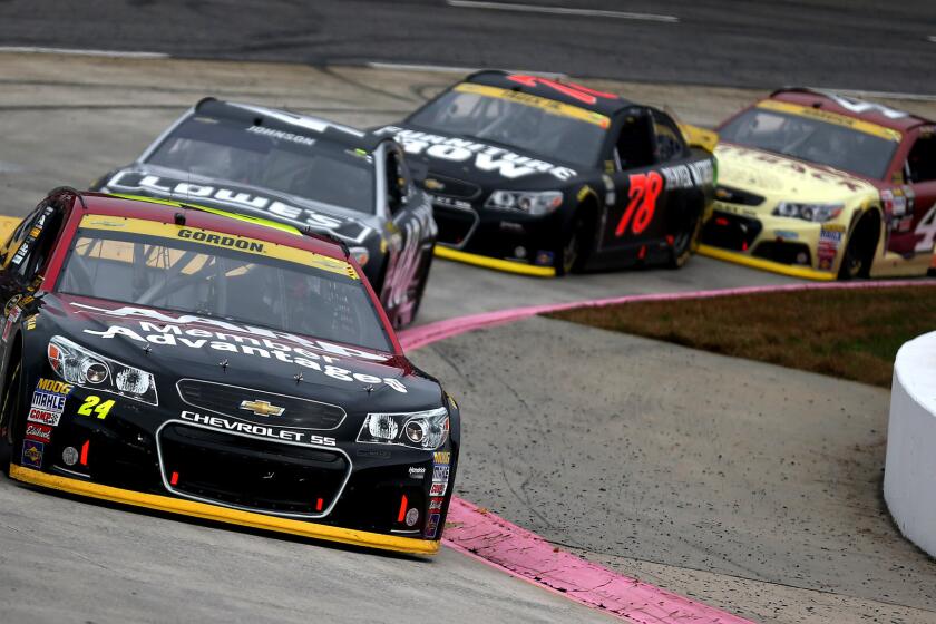 NASCAR driver Jeff Gordon leads the pack during the Sprint Cup Series race at Martinsville Speedway on Sunday.