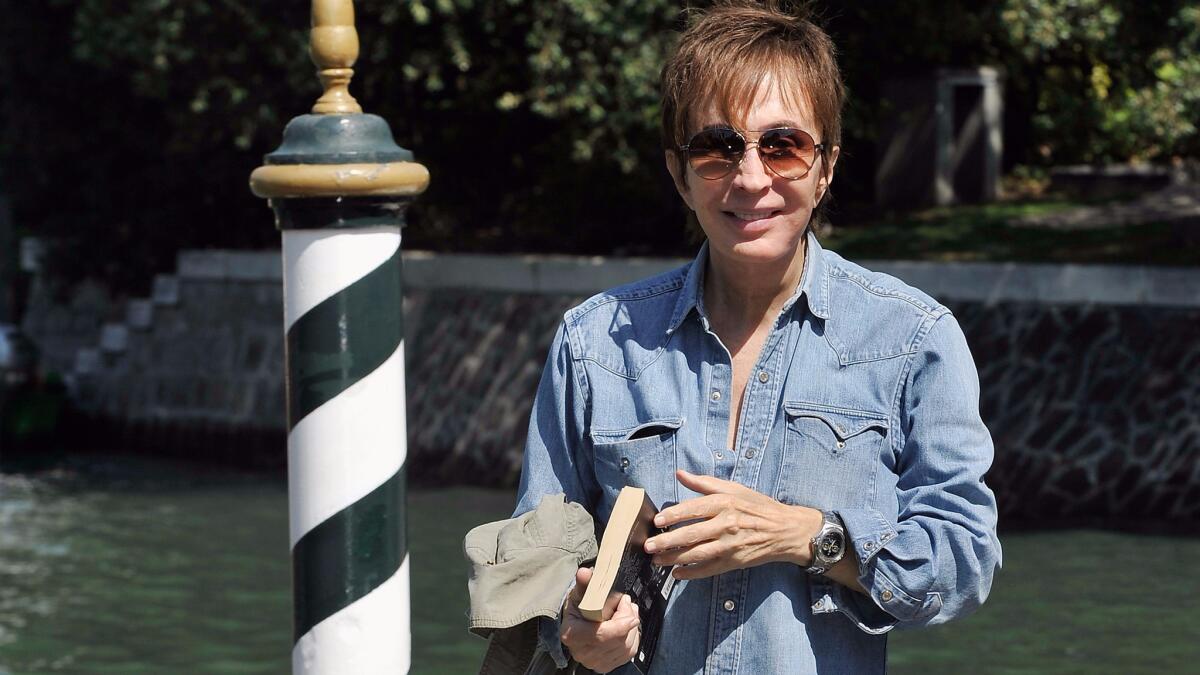 Michael Cimino arrives at the Hotel Excelsior during the 69th Venice International Film Festival.