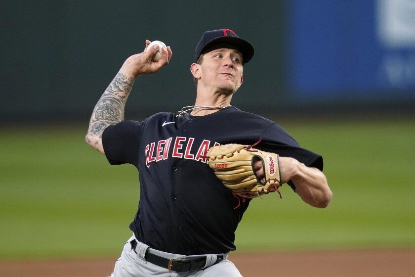 Cleveland Indians starting pitcher Zach Plesac throws to a Seattle Mariners batter during the fifth inning of a baseball game Thursday, May 13, 2021, in Seattle. (AP Photo/Elaine Thompson)