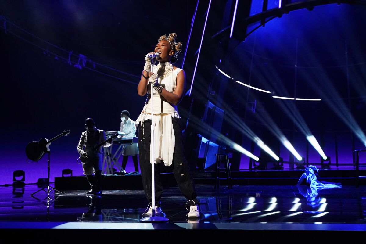 Brandy performs during the 2020 Billboard Music Awards.