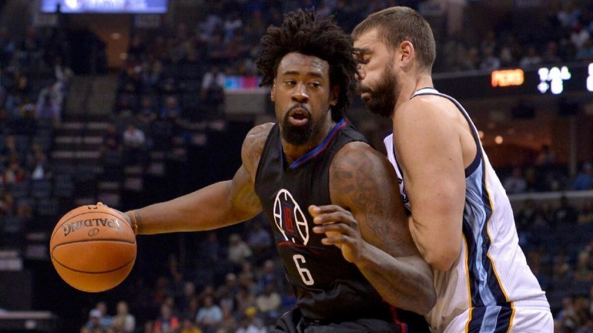 Clippers center DeAndre Jordan works against Memphis Grizzlies center Marc Gasol during a game on Nov. 4.