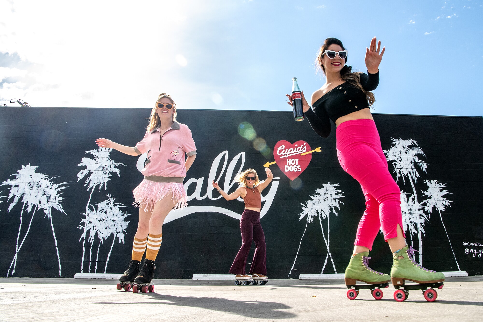 Morgan and Kelly Walsh and Adrianna Gaxiola roller skate in Winnetka
