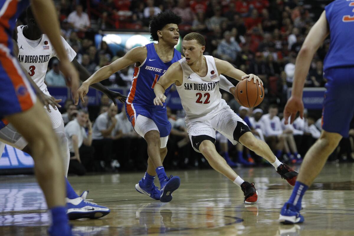 San Diego State's Malachi Flynn drives against Boise State on March 6, 2020.