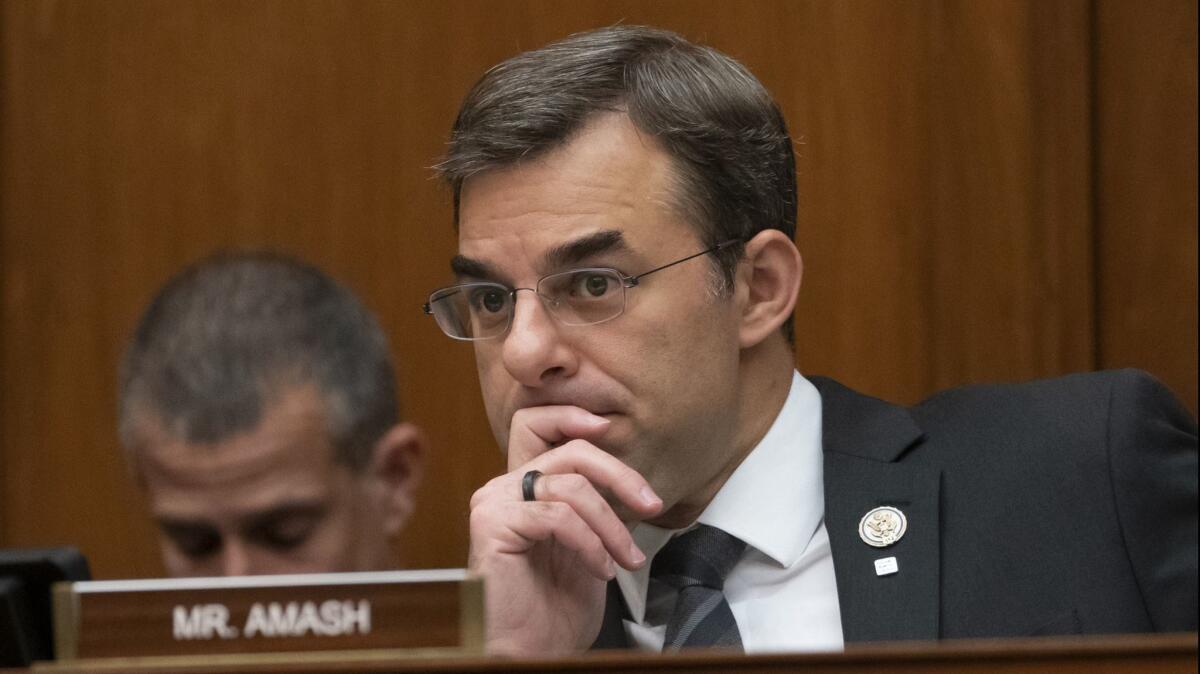 Rep. Justin Amash (R-Mich.) listens to debate during a House Oversight and Reform Committee meeting on June 12.
