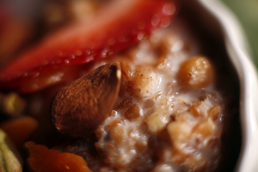 Bulgar wheat pudding with fruit, nuts and honey.