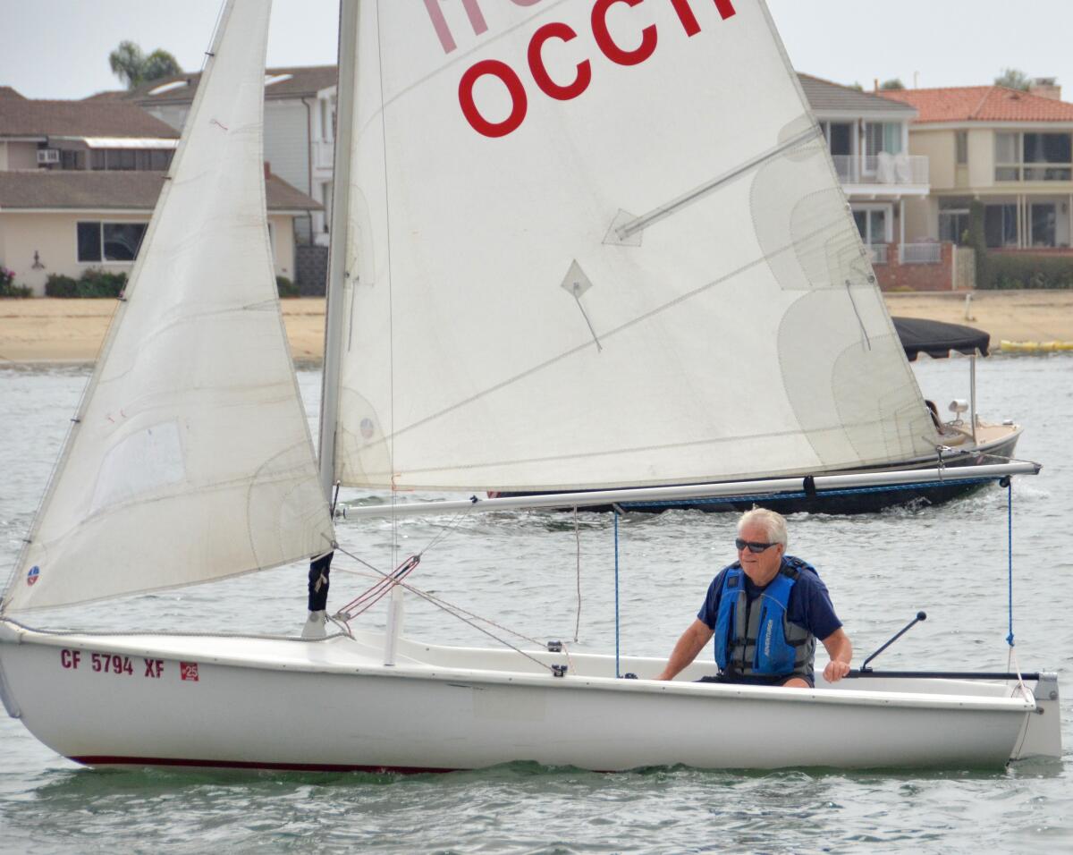 Art Adair, a dedicated student to OCC's sailing program, has become adept at sailing a Lido 14.