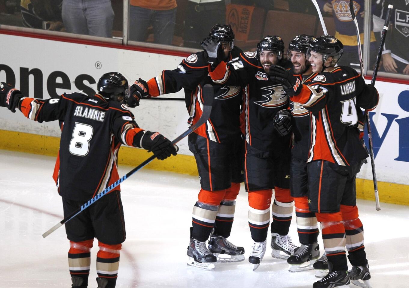 Ducks players celebrate a second-period goal by Devante Smith-Pelly against the Kings in Game 5 of the Western Conference semifinals at Honda Center.