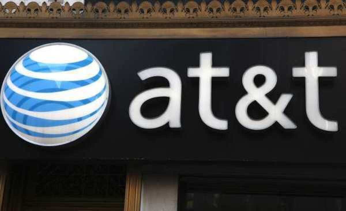 AT&T says the move to phase out 2G is part of its efforts to improve network performance and address the need for additional spectrum capacity. Above, an AT&T store in New York.
