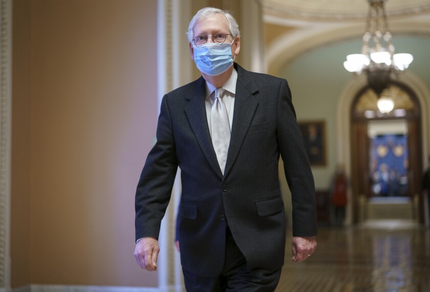 Senate Minority Leader Mitch McConnell, R-Ky., leaves the chamber as the Senate holds the final vote to confirm Xavier Becerra, President Joe Biden's pick to be secretary of Health and Human Services, at the Capitol in Washington, Thursday, March 18, 2021. (AP Photo/J. Scott Applewhite)