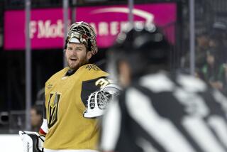 Vegas Golden Knights goaltender Jonathan Quick speaks to a referee during the third period of an NHL hockey game against the Calgary Flames on Thursday, March 16, 2023, in Las Vegas. (AP Photo/Ellen Schmidt)