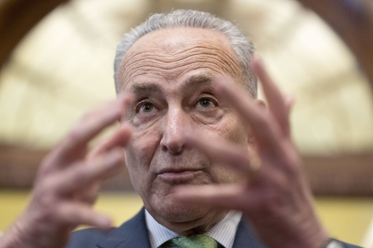 Senate Majority Leader Chuck Schumer of N.Y., speaks with reporters at the Capitol in Washington, Thursday, June 24, 2021. A bipartisan group of lawmakers have negotiated a plan to pay for an estimated $1 trillion compromise plan. (AP Photo/Alex Brandon)