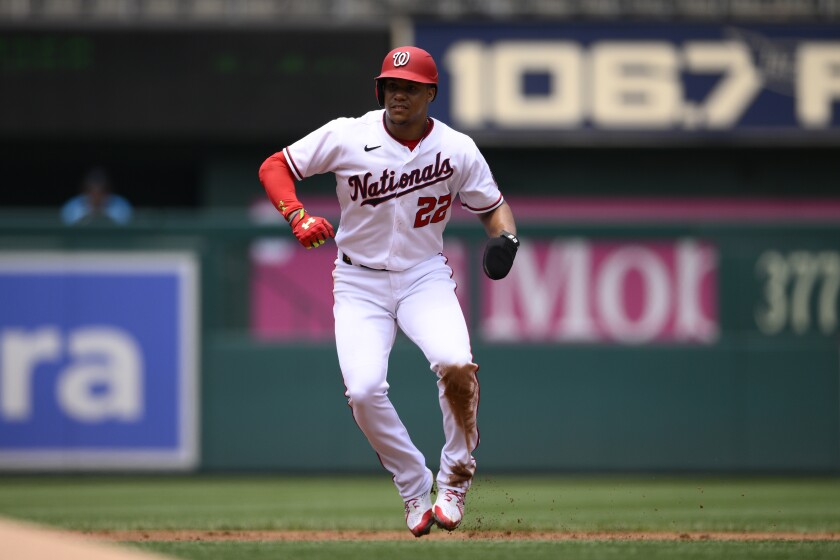 Washington Nationals' Juan Soto takes a lead from second during the first inning of a baseball game against the Miami Marlins, Sunday, July 3, 2022, in Washington. (AP Photo/Nick Wass)