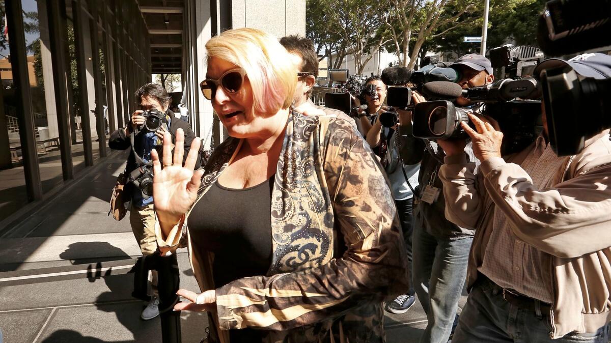 Samantha Geimer is surrounded by cameras as she arrives at Los Angeles County Superior Court in June 2017.