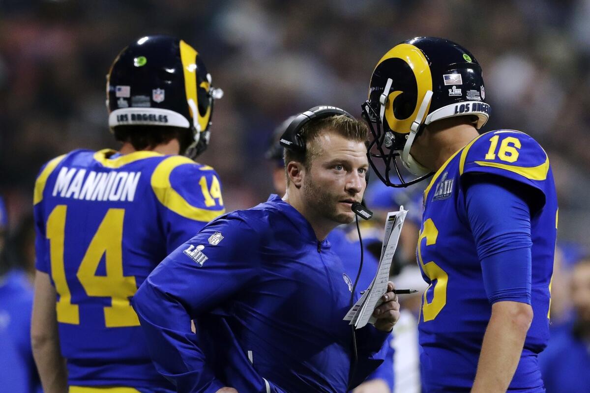 Rams head coach Sean McVay speaks to Jared Goff (16) on the sideline during the Super Bowl in 2019.