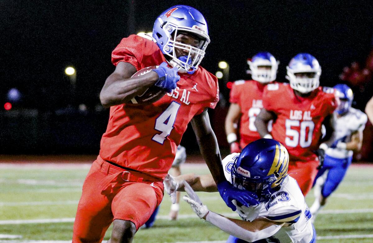 Los Alamitos' Damian Henderson ran for 257 yards against Edison on Thursday.