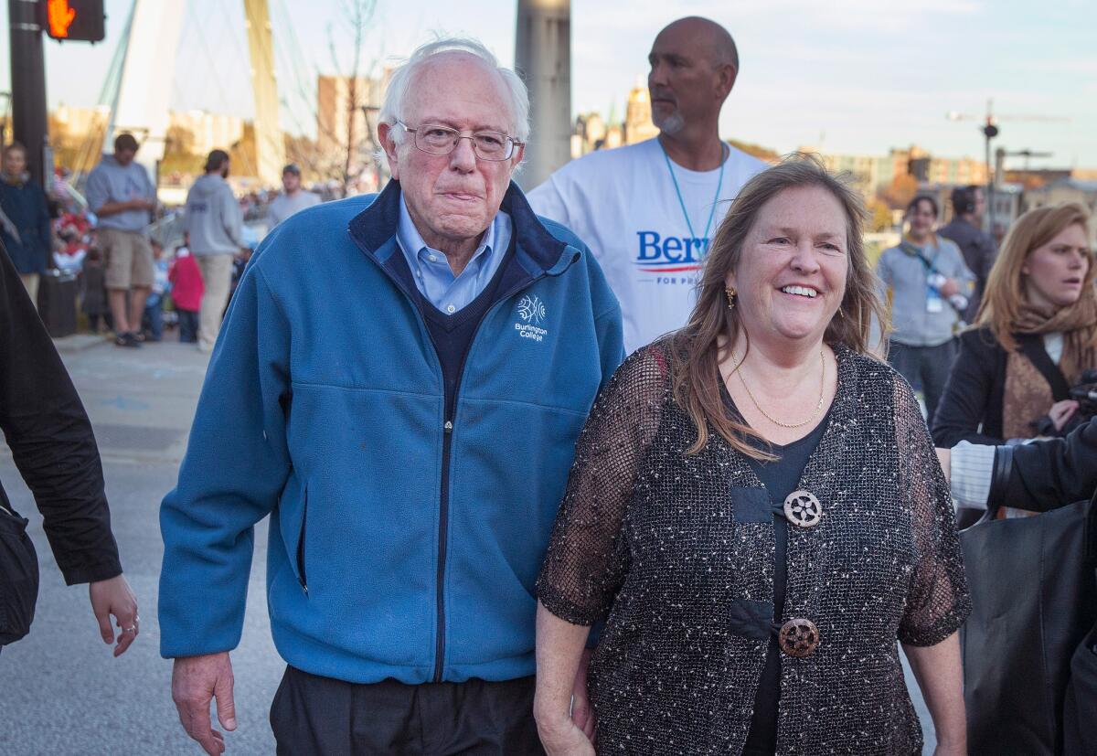 Democratic presidential candidate Bernie Sanders and his wife Jane head to a fundraiser for Iowa's Democratic Party on Oct. 24.