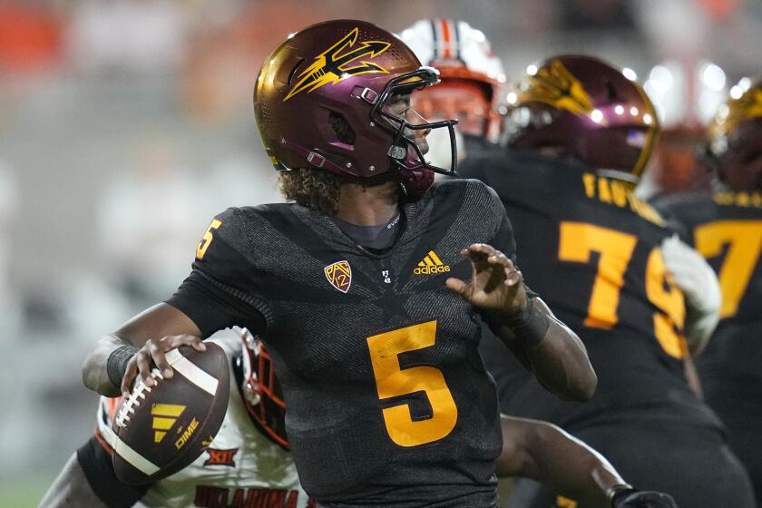 FILE - Arizona State quarterback Jaden Rashada throws a pass against Oklahoma State during the second half of an NCAA college football game Saturday, Sept. 9, 2023, in Tempe, Ariz. Rashada has committed to Georgia and is back in the Southeastern Conference after the one-time Florida commit's NIL deal fell apart. (AP Photo/Ross D. Franklin, File)