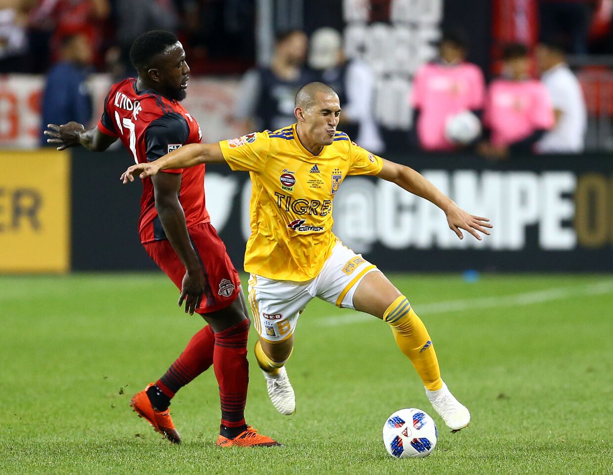 TORONTO, ON - SEPTEMBER 19: Jozy Altidore #17 of Toronto FC tackles Jorge Torres #6 of Tigres UANL during the second half of the 2018 Campeones Cup Final at BMO Field on September 19, 2018 in Toronto, Canada. (Photo by Vaughn Ridley/Getty Images) ** OUTS - ELSENT, FPG, CM - OUTS * NM, PH, VA if sourced by CT, LA or MoD **