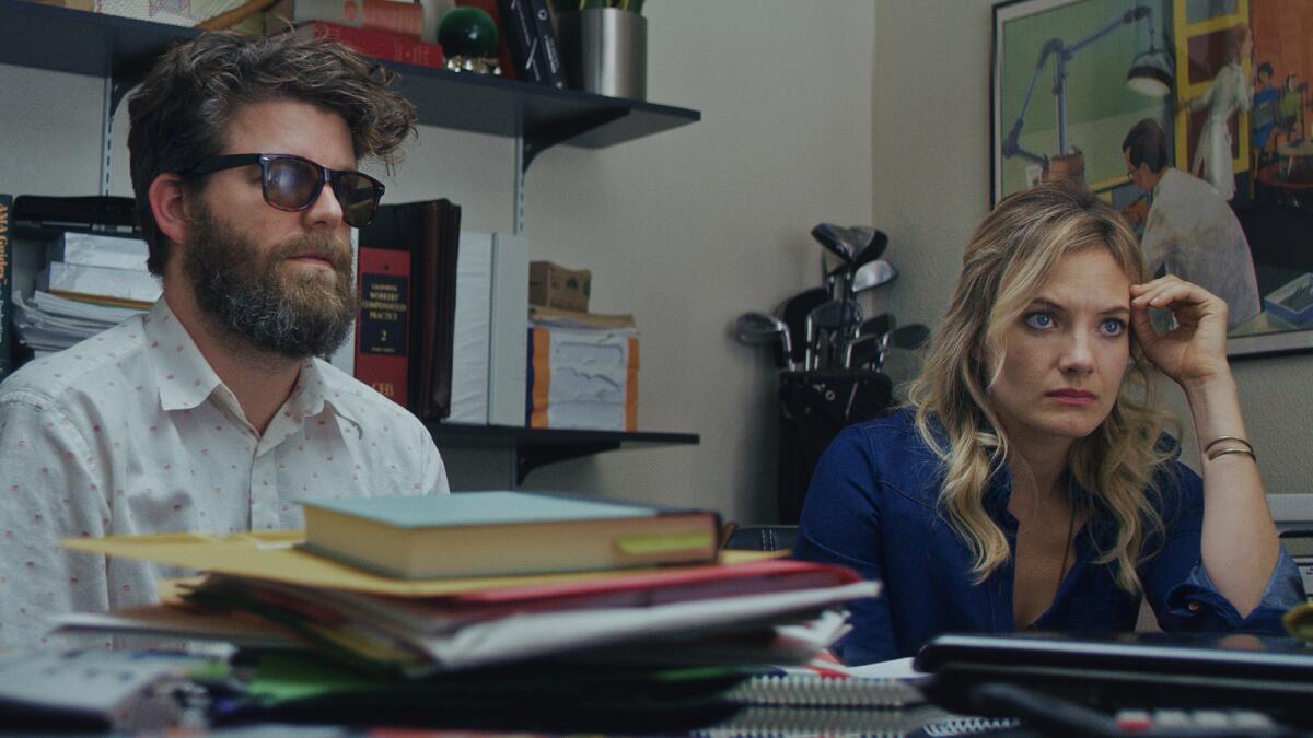 Scott Rodgers and Kristin Slaysman in the movie "Dr. Brinks & Dr. Brinks."