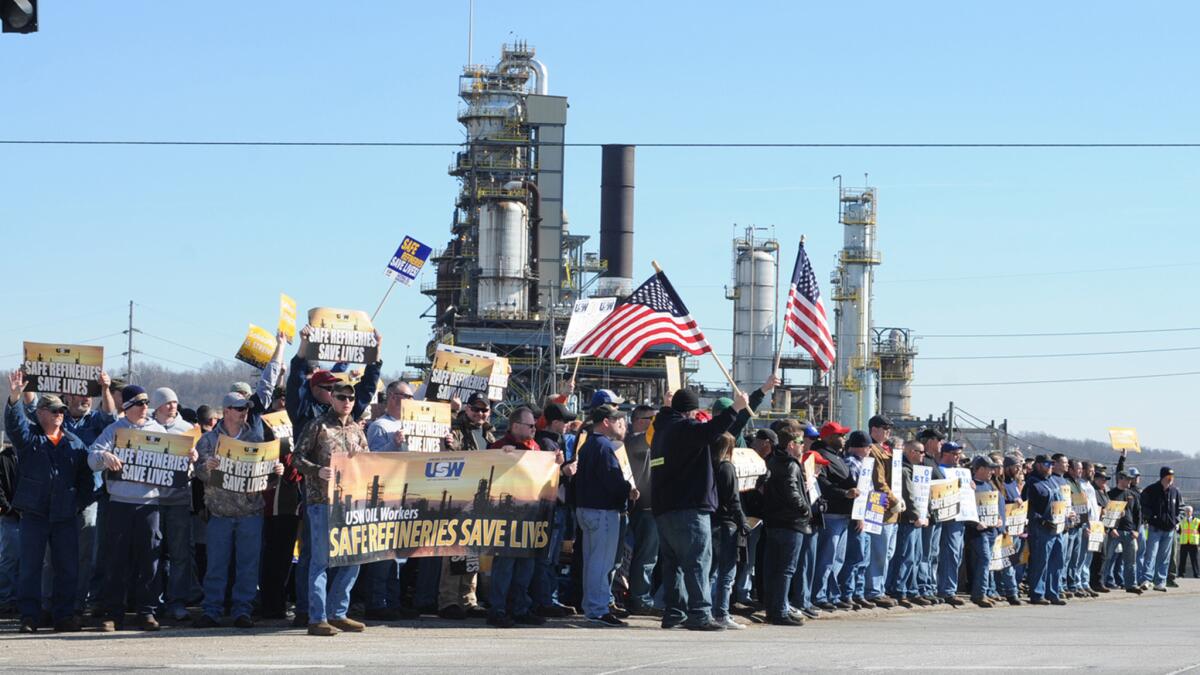 USW workers picket outside the Marathon refinery in Catlettsburg, Ky. The nationwide strike expanded in its fourth week to 15 plants.