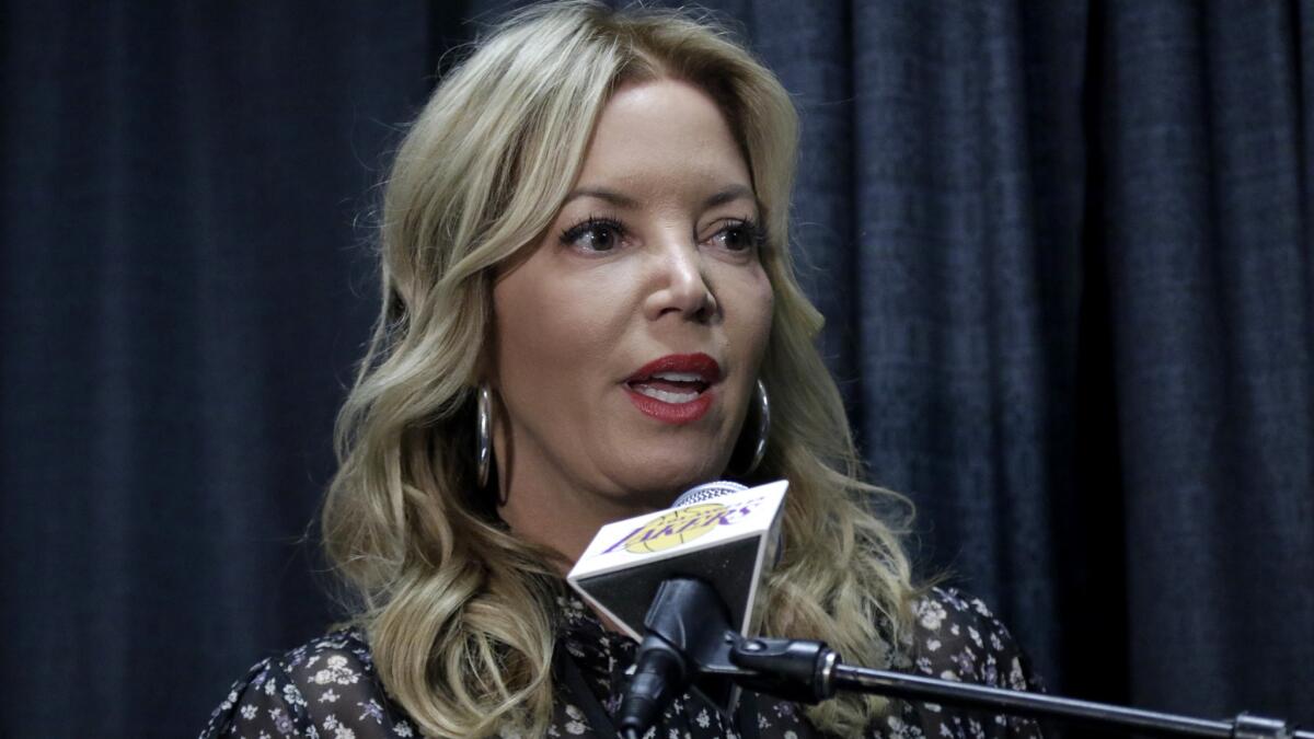 Jeanie Buss fired her brother Jim as executive vice president of basketball operations and replaced him with Lakers legend Magic Johnson on Feb. 21.