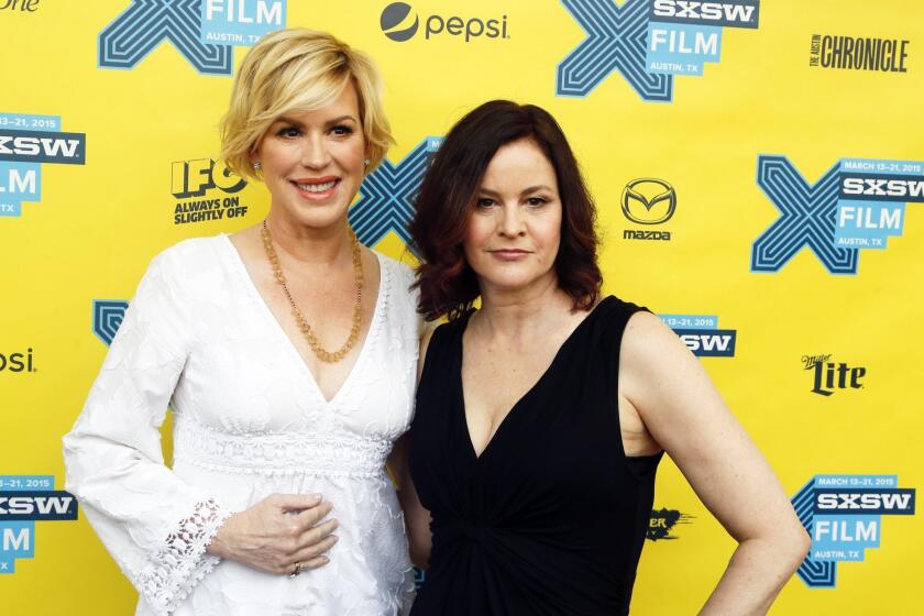 Molly Ringwald, left, and Ally Sheedy walk the red carpet for the 30th anniversary screening of "The Breakfast Club" during the South by Southwest film festival.