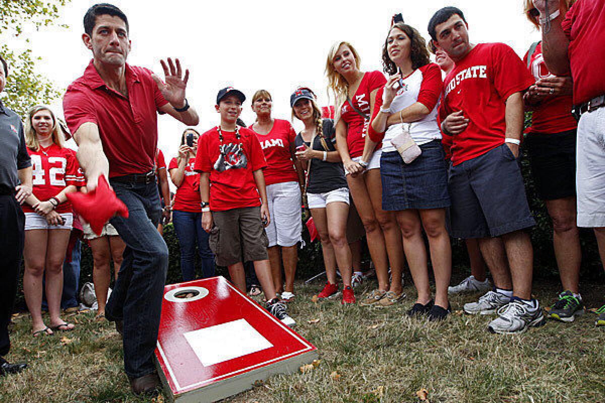Republican vice presidential candidate Rep. Paul Ryan plays cornhole during a tailgate party at the Ohio State University-Miami University of Ohio football game at Ohio Stadium in Columbus, Ohio.