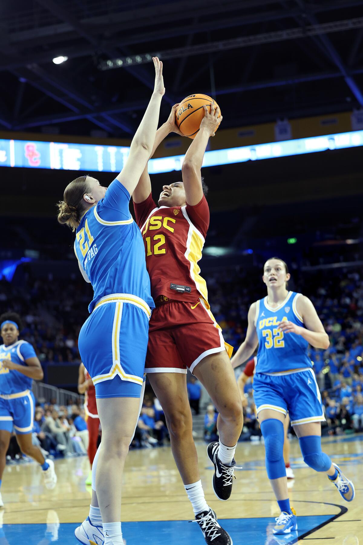 USC's JuJu Watkins drives on UCLA's Lina Sontag during the first half Saturday at Pauley Pavilion.