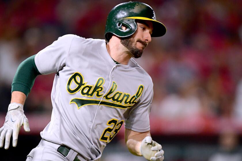ANAHEIM, CA - AUGUST 04: Matt Joyce #23 of the Oakland Athletics runs on his RBI double to take a 6-2 lead over the Los Angeles Angels during the sixth inning at Angel Stadium of Anaheim on August 4, 2017 in Anaheim, California. (Photo by Harry How/Getty Images) ** OUTS - ELSENT, FPG, CM - OUTS * NM, PH, VA if sourced by CT, LA or MoD **