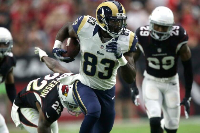 Rams receiver Brian Quick scores on a 65-yard catch-and-run against the Arizona Cardinals at University of Phoenix Stadium on Oct. 2.