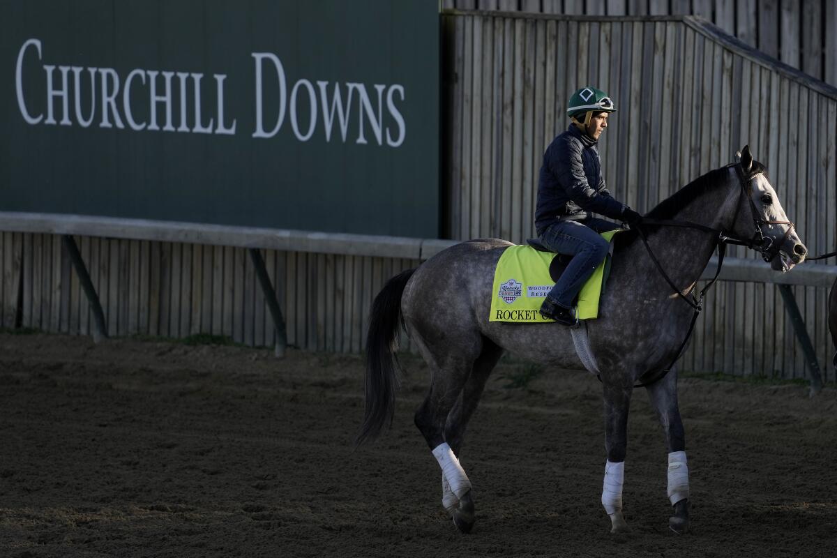 A jockey works out Kentucky Derby hopeful Rocket Can at Churchill Downs on Wednesday