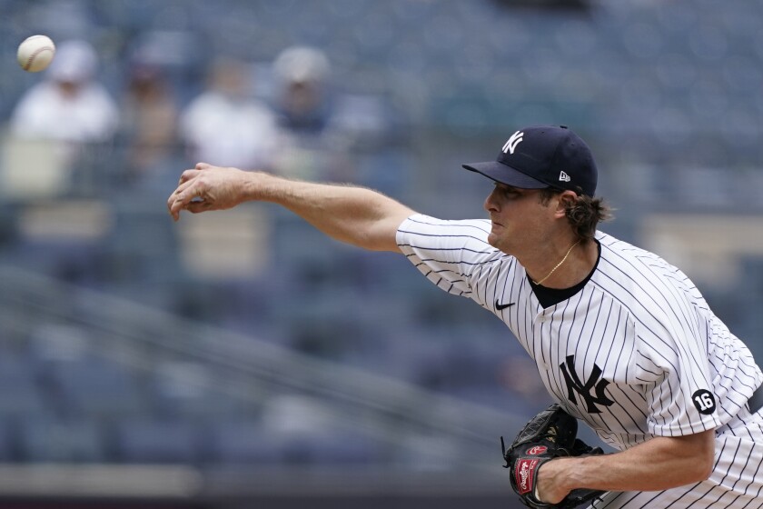 New York Yankees starting pitcher Gerrit Cole delivers during the first inning of a baseball game against the Tampa Bay Rays, Thursday, June 3, 2021, at Yankee Stadium in New York. (AP Photo/Kathy Willens)