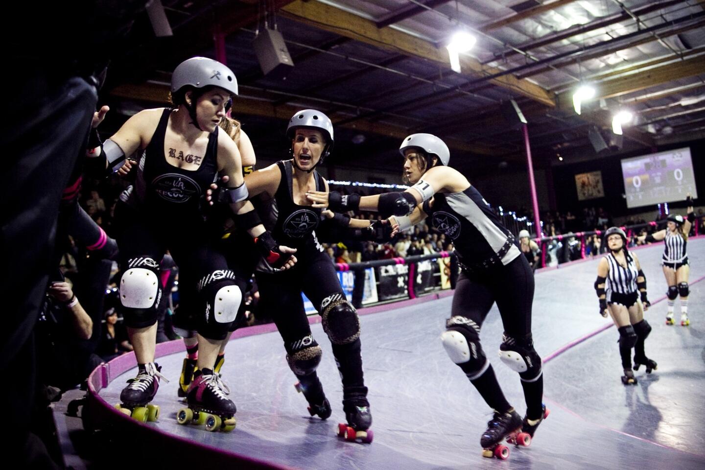 The Ri-Ettes, a member of the Los Angeles Derby Dolls roller derby league, battle the Pennsylvania All Star Rollers at the "Doll Factory" in L.A.'s Historic Filipinotown. The Ri-Ettes prevailed.
