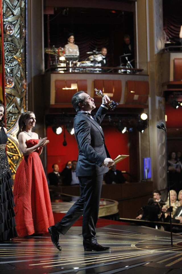 "The Artist" actor celebrates his lead actor win from the Oscar stage.