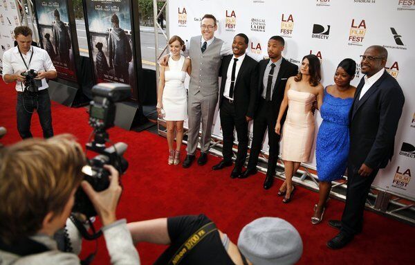 Posing for photographers are actors Ahna O'Reilly, left, Kevin Durand, director Ryan Coogler, actors Michael B. Jordan, Melonie Diaz, Octavia Spencer and producer Forest Whitaker at the 2013 Los Angeles Film Festival screening of "Fruitvale Station" on June 17, 2013.