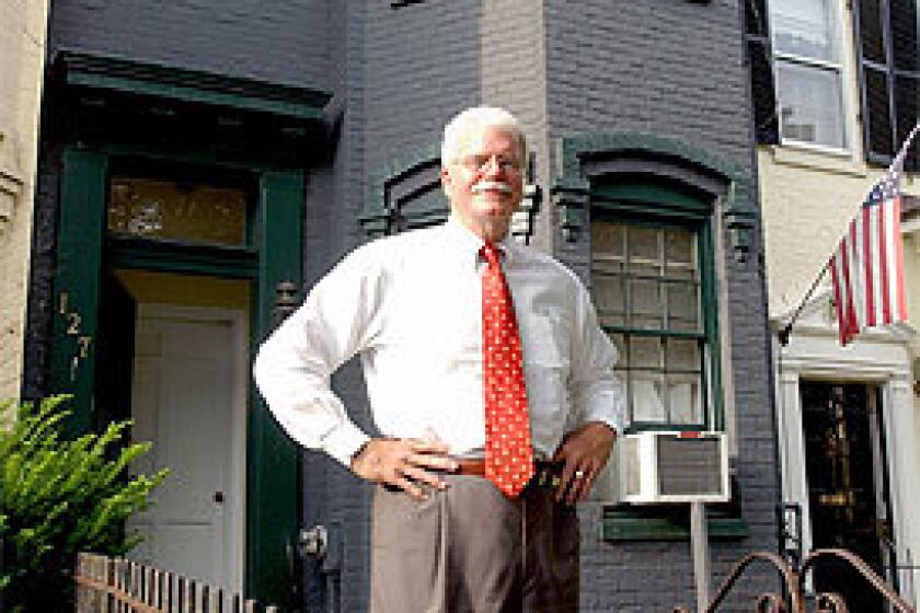 LIVE-IN LANDLORD: Rep. George Miller in front of his Washington town house (the animal house) that he has shared with various fellow Democrats for more than 20 years. The house has few rules, but no Republicans are allowed.