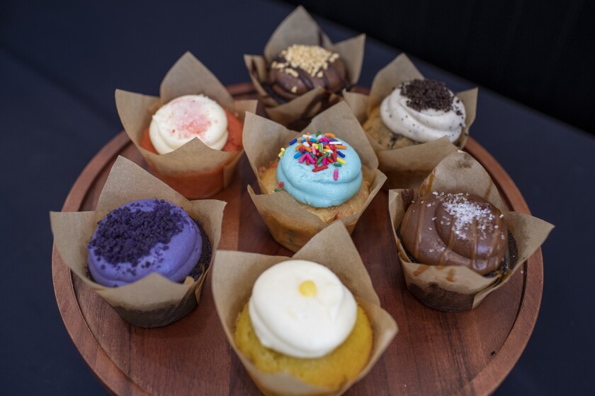 An assortment of mixed cupcakes from the Baked Dessert Bar in Tustin, pictured Thursday, July 14.