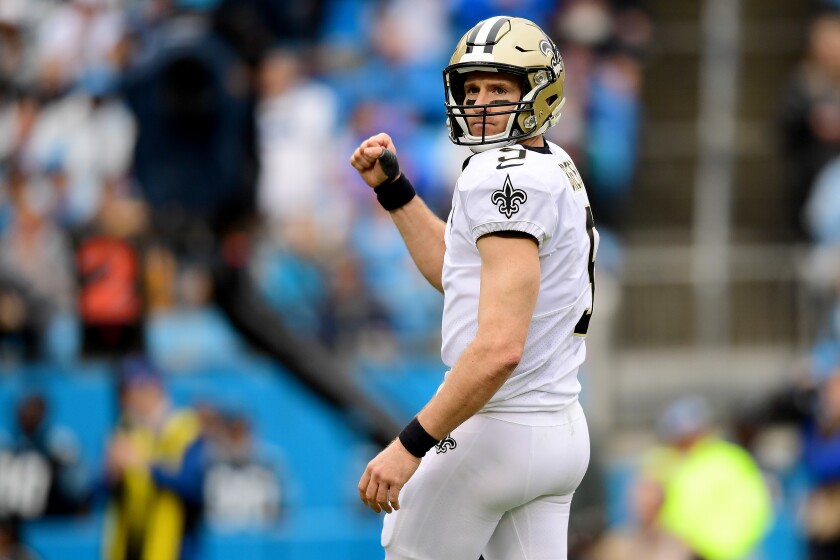 Drew Brees reacts after a Saints touchdown against the Panthers on Dec. 29 at Bank of America Stadium.