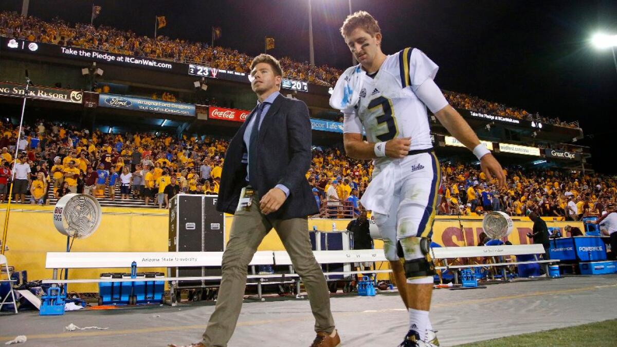 UCLA quarterback Josh Rosen walks off the field after suffering what turned out to be a season-ending injury in the Bruins' game against Arizona State on Oct. 8.