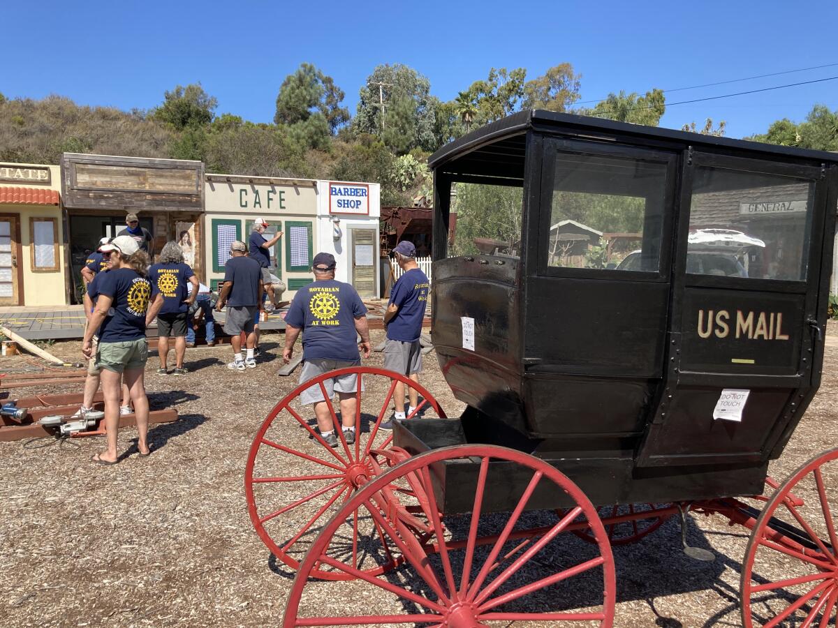 A nearly century-old postal wagon will be sheltered in a structure built by Encinitas Rotary Club members.